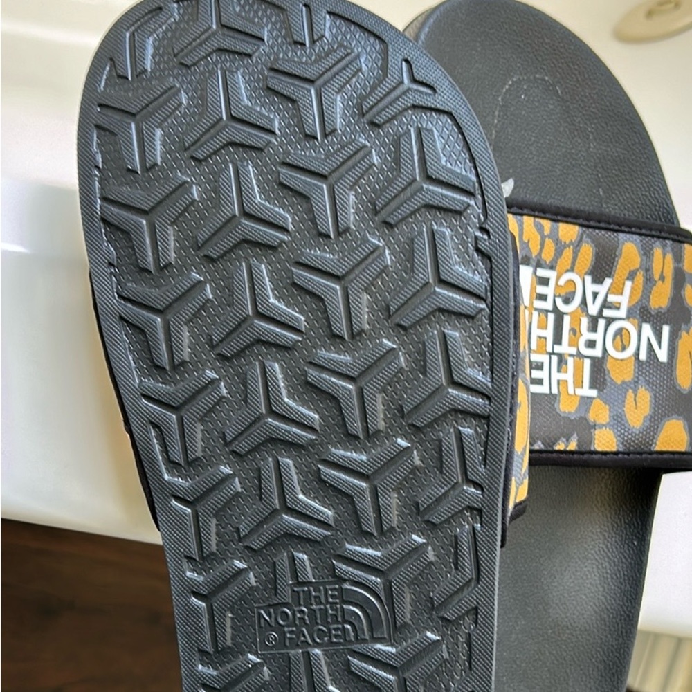 The North Face III animal print slides